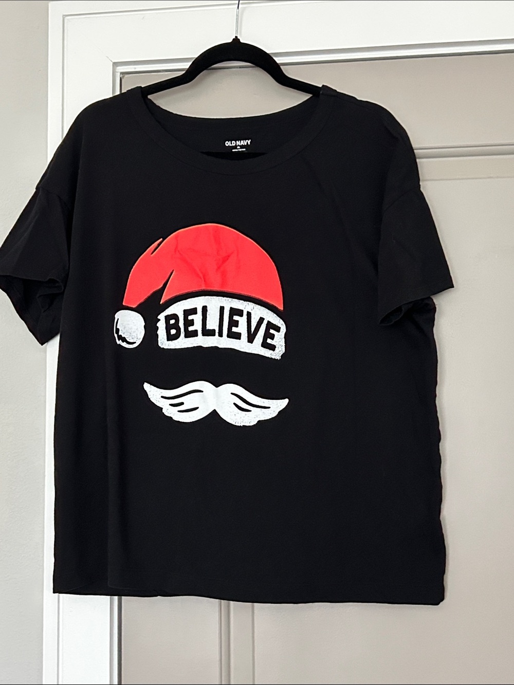 Old Navy Graphic Tee with “BELIEVE” Santa Hat & Mustache
